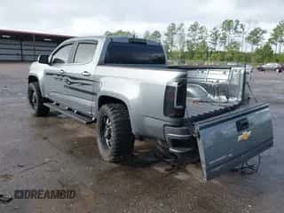 2019 Chevrolet Colorado 2WD Work Truck z VIN 1GCGSBEN8K1109036, wystawiony jako IAAI lot #43390057 z przebiegiem 86 809 mil mil oraz . Historia ofert i sprzedaży dostępna na DreamBid. Obrazek 3.