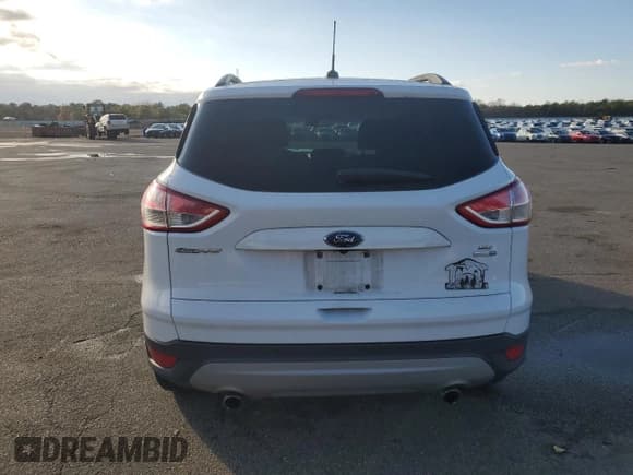 ✅ 2016 Ford Escape SE • VIN: 1FMCU9GX4GUB18446 • Лот: 92720625. Опубликован ранее на Copart с пробегом 70 164 миль. Бесплатный доступ к архиву аукционных продаж из США и подробный отчёт об истории автомобиля на DreamBid. Изображение 6.