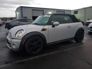 ✅ 2014 MINI Convertible • VIN: WMWZN3C59ET569787 • Lot: 91132095. Listed on Copart with 56,607 mi. Free auction sales archive from the USA and detailed vehicle history report at DreamBid. Image 1.