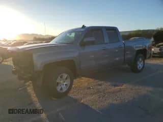2015 Chevrolet Silverado 1500 LT with VIN 1GCRCREC4FZ262324, listed as a Copart auction lot 84000115 with 129,765 mi miles and Salvage title. Bid and sale history available at DreamBid. Image 1.