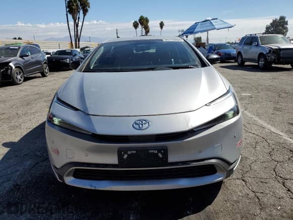 2024 Toyota Prius SE с VIN JTDACACU8R3014689, выставлен на аукционе Copart как лот 85173005 с пробегом 30 579 миль миль и Списание • Salvage title. История ставок и продаж доступна на DreamBid. Изображение 5.