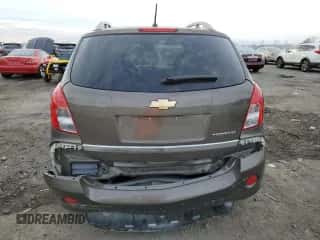 2014 Chevrolet Captiva Sport LT z VIN 3GNAL3EK3ES664582, wystawiony jako Copart lot #81323704 z przebiegiem 168 689 mil mil oraz Szkoda całkowita • Salvage title. Historia ofert i sprzedaży dostępna na DreamBid. Obrazek 6.
