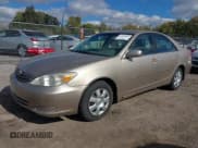 ✅ 2002 Toyota Camry LE • VIN: JTDBE32K920049565 • Lot: 43593947. Listed on IAAI with 184,908 mi. Free auction sales archive from the USA and detailed vehicle history report at DreamBid. Image 2.