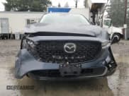 ✅ 2023 Mazda CX-5 S Carbon Edition • VIN: JM3KFBCM2P0285545 • Лот: 92729195. Опубликован ранее на Copart с пробегом 22 401 миль. Бесплатный доступ к архиву аукционных продаж из США и подробный отчёт об истории автомобиля на DreamBid. Изображение 5.