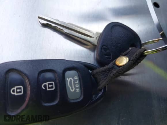 2013 Hyundai Genesis Coupe Track z VIN KMHHU6KJ3DU084938, wystawiony jako IAAI lot #43627084 z przebiegiem 94 580 mil mil oraz . Historia ofert i sprzedaży dostępna na DreamBid. Obrazek 11.