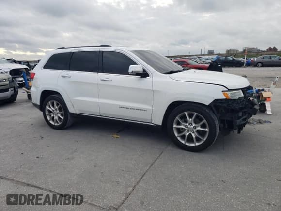 ✅ 2015 Jeep Grand Cherokee Summit • VIN: 1C4RJEJG8FC131925 • Lot: 55270785. Listed on Copart with 130,425 mi. Free auction sales archive from the USA and detailed vehicle history report at DreamBid. Image 4.