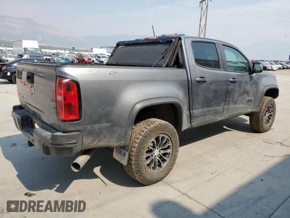 ✅ 2020 Chevrolet Colorado 4WD ZR2 • VIN: 1GCPTEE1XL1183958 • Lot: 65965574. Listed on Copart with 85,035 mi. Free auction sales archive from the USA and detailed vehicle history report at DreamBid. Image 3.