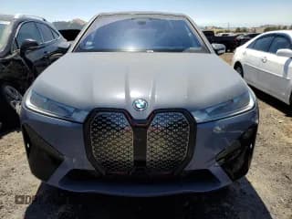 ✅ 2024 BMW iX xDrive50 • VIN: WB523CF08RCN95566 • Лот: 58774374. Опубликован ранее на Copart с пробегом 4 148 миль. Бесплатный доступ к архиву аукционных продаж из США и подробный отчёт об истории автомобиля на DreamBid. Изображение 5.