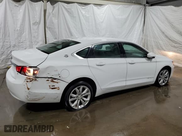 ✅ 2018 Chevrolet Impala LT • VIN: 2G1105S37J9146386 • Лот: 71829404. Опубликован ранее на Copart с пробегом 140 373 миль. Бесплатный доступ к архиву аукционных продаж из США и подробный отчёт об истории автомобиля на DreamBid. Изображение 3.