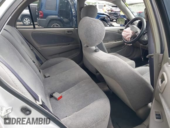 ✅ 1999 Toyota Corolla VE • VIN: 2T1BR12E9XC180124 • Lot: 42989717. Listed on IAAI with 184,062 mi. Free auction sales archive from the USA and detailed vehicle history report at DreamBid. Image 8.