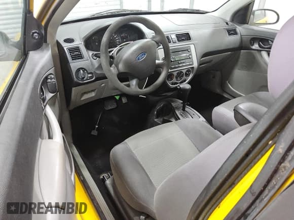 ✅ 2007 Ford Focus S • VIN: 1FAFP31N47W198161 • Lot: 68484975. Wystawiony na Copart z przebiegiem 144 702 mil. Bezpłatny archiwum sprzedaży aukcyjnych z USA i szczegółowy raport historii pojazdu na DreamBid. Zdjęcie 8.