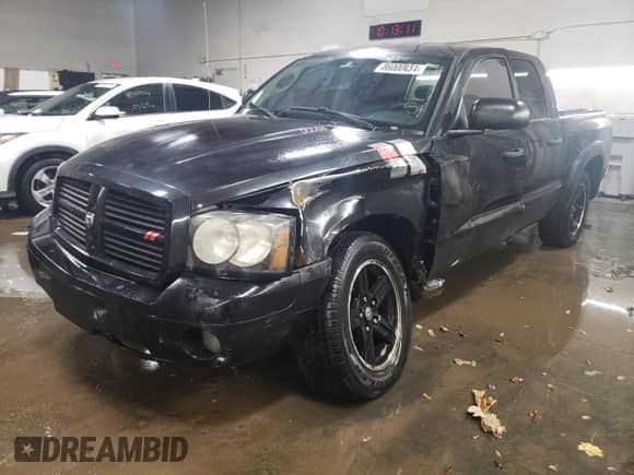 2007 Dodge Dakota SLT с VIN 1D7HW48K17S263679, выставлен на аукционе Copart как лот 86000434 с пробегом 183 379 миль миль и Списание • Salvage title. История ставок и продаж доступна на DreamBid. Изображение 1.
