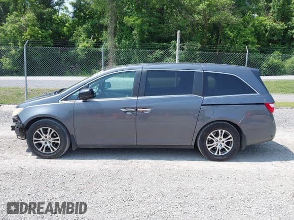 ✅ 2012 Honda Odyssey EX-L • VIN: 5FNRL5H65CB015247 • Lot: 42400390. Listed on IAAI with 226,679 mi. Free auction sales archive from the USA and detailed vehicle history report at DreamBid. Image 14.