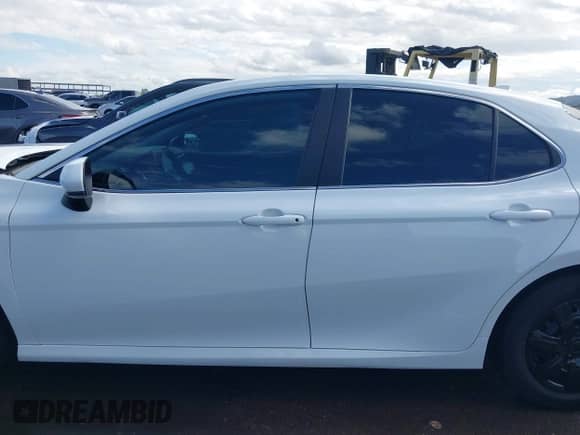 2021 Toyota Camry Hybrid LE with VIN 4T1C31AK8MU030335, listed as a IAAI auction lot 43438433 with 79,774 mi miles and . Bid and sale history available at DreamBid. Image 14.