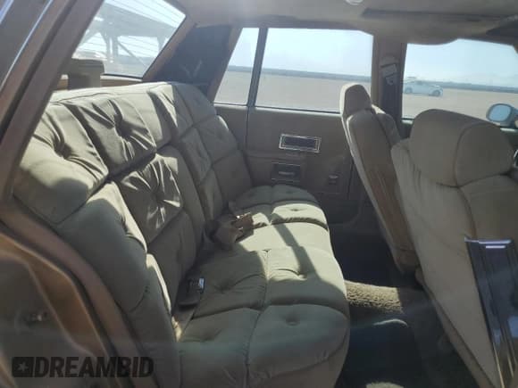 ✅ 1986 Pontiac Parisienne • VIN: 1G2BT69Y2GX267691 • Lot: 79337604. Listed on Copart with 55,458 mi. Free auction sales archive from the USA and detailed vehicle history report at DreamBid. Image 10.