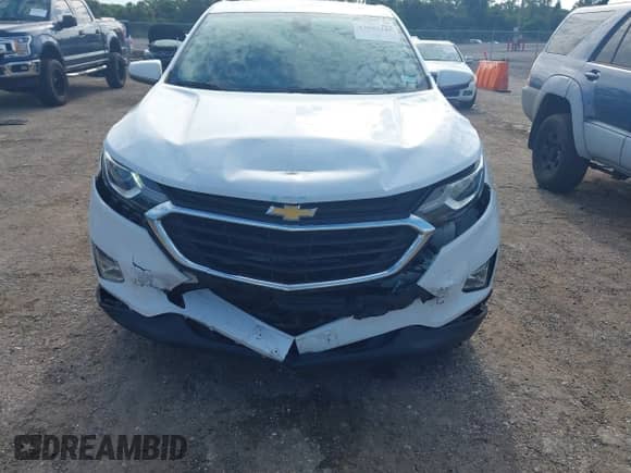 2020 Chevrolet Equinox LT z VIN 2GNAXKEV4L6180165, wystawiony jako IAAI lot #43087345 z przebiegiem 108 585 mil mil oraz . Historia ofert i sprzedaży dostępna na DreamBid. Obrazek 6.