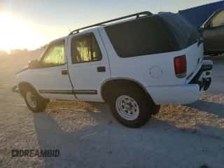 2001 Chevrolet Blazer LT z VIN 1GNCS13WX12223480, wystawiony jako Copart lot #82250894 z przebiegiem 189 924 mil mil oraz Szkoda całkowita • Salvage title. Historia ofert i sprzedaży dostępna na DreamBid. Obrazek 2.