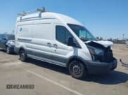 ✅ 2015 Ford Transit Cargo • VIN: 1FTNR2XM9FKA18848 • Lot: 42218203. Listed on IAAI with 162,184 mi. Free auction sales archive from the USA and detailed vehicle history report at DreamBid. Image 1.