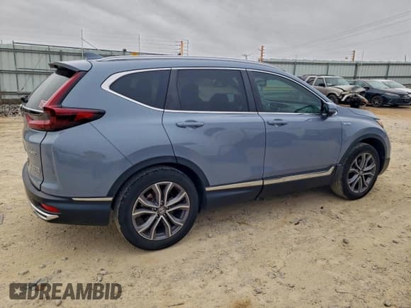✅ 2022 Honda CR-V Touring • VIN: 5J6RT6H98NL011252 • Lot: 93649295. Listed on Copart with 29,939 mi. Free auction sales archive from the USA and detailed vehicle history report at DreamBid. Image 3.