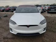 ✅ 2018 Tesla Model X 75D • VIN: 5YJXCDE44JF109492 • Lot: 69084543. Listed on Copart with 52,025 mi. Free auction sales archive from the USA and detailed vehicle history report at DreamBid. Image 5.