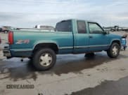 ✅ 1998 GMC Sierra 1500 • VIN: 2GTEK19R1W1526058 • Лот: 66497285. Опубликован ранее на Copart с пробегом 275 485 миль. Бесплатный доступ к архиву аукционных продаж из США и подробный отчёт об истории автомобиля на DreamBid. Изображение 3.