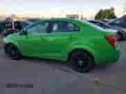 2015 Chevrolet Sonic LT с VIN 1G1JC5SH4F4163398, выставлен на аукционе Copart как лот 71773444 с пробегом 121 909 миль миль и Списание • Salvage title. История ставок и продаж доступна на DreamBid. Изображение 2.