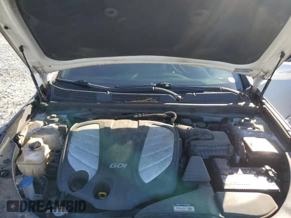 2013 Hyundai Azera z VIN KMHFH4JG7DA321468, wystawiony jako Copart lot #87069554 z przebiegiem 147 382 mil mil oraz Szkoda całkowita • Salvage title. Historia ofert i sprzedaży dostępna na DreamBid. Obrazek 11.