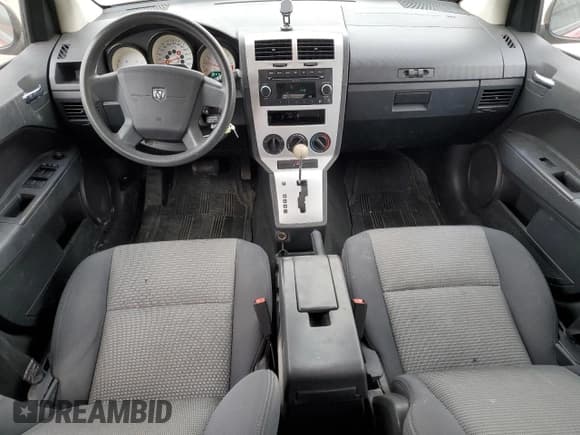 ✅ 2009 Dodge Caliber SXT • VIN: 1B3HB48A89D128026 • Лот: 81020804. Опубликован ранее на Copart с пробегом 244 825 миль. Бесплатный доступ к архиву аукционных продаж из США и подробный отчёт об истории автомобиля на DreamBid. Изображение 8.