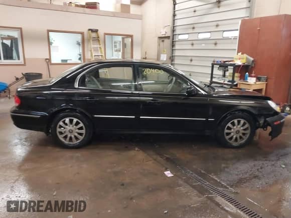 2004 Hyundai Sonata GLS z VIN KMHWF35H94A010675, wystawiony jako IAAI lot #41520400 z przebiegiem 156 631 mil mil oraz . Historia ofert i sprzedaży dostępna na DreamBid. Obrazek 13.