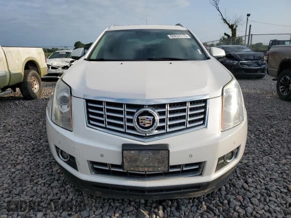✅ 2016 Cadillac SRX Premium Collection • VIN: 3GYFNDE37GS551769 • Lot: 69224115. Wystawiony na Copart z przebiegiem 113 338 mil. Bezpłatny archiwum sprzedaży aukcyjnych z USA i szczegółowy raport historii pojazdu na DreamBid. Zdjęcie 5.