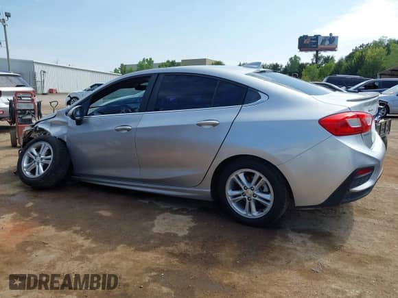 2017 Chevrolet Cruze LT with VIN 1G1BE5SM1H7257414, listed as a IAAI auction lot 43180998 with 103,728 mi miles and . Bid and sale history available at DreamBid. Image 14.