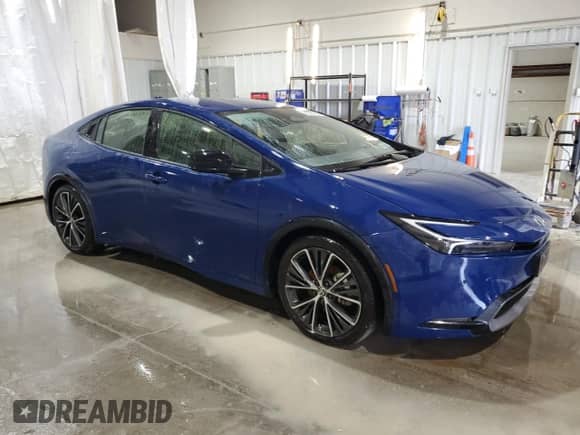 2024 Toyota Prius Limited with VIN JTDADABU3R3023573, listed as a Copart auction lot 80960385 with 5,801 mi miles and Salvage title. Bid and sale history available at DreamBid. Image 4.