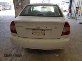 2002 Hyundai Accent GL with VIN KMHCG45C82U380280, listed as a Copart auction lot 79087254 with 173,764 mi miles and Clean title. Bid and sale history available at DreamBid. Image 6.