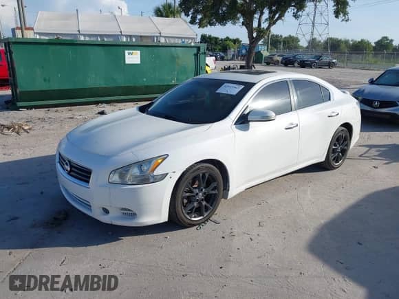 2012 Nissan Maxima S z VIN 1N4AA5APXCC849233, wystawiony jako IAAI lot #42915963 z przebiegiem 119 679 mil mil oraz . Historia ofert i sprzedaży dostępna na DreamBid. Obrazek 2.