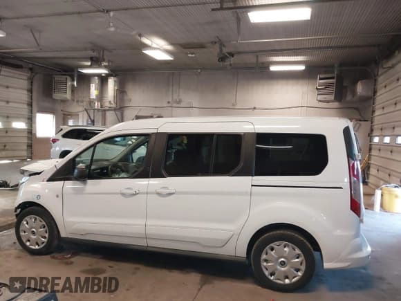 ✅ 2014 Ford Transit Connect XLT • VIN: NM0GS9F71E1136153 • Lot: 41745624. Listed on IAAI with 252,218 mi. Free auction sales archive from the USA and detailed vehicle history report at DreamBid. Image 15.