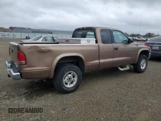 ✅ 2000 Dodge Dakota Sport • VIN: 1B7GG22N0YS701801 • Lot: 80586704. Wystawiony na Copart z przebiegiem 208 181 mil. Bezpłatny archiwum sprzedaży aukcyjnych z USA i szczegółowy raport historii pojazdu na DreamBid. Zdjęcie 3.