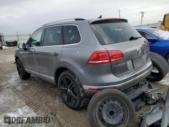 ✅ 2017 Volkswagen Touareg Wolfsburg Edition • VIN: WVGRF7BP1HD003191 • Лот: 70357642. Опубликован ранее на Copart с пробегом 101 295 миль. Бесплатный доступ к архиву аукционных продаж из США и подробный отчёт об истории автомобиля на DreamBid. Изображение 2.