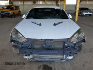 ✅ 2013 Hyundai Genesis Coupe 2.0T • VIN: KMHHT6KD6DU083957 • Lot: 59933145. Wystawiony na Copart z przebiegiem 114 276 mil. Bezpłatny archiwum sprzedaży aukcyjnych z USA i szczegółowy raport historii pojazdu na DreamBid. Zdjęcie 5.