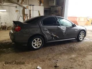 ✅ 2003 Dodge Neon SXT • VIN: 1B3ES56C33D218401 • Lot: 65321163. Listed on Copart with 151,640 mi. Free auction sales archive from the USA and detailed vehicle history report at DreamBid. Image 3.