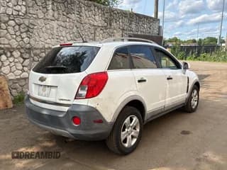✅ 2014 Chevrolet Captiva Sport LS • VIN: 3GNAL2EK4ES615675 • Lot: 59599885. Wystawiony na Copart z przebiegiem 82 550 mil. Bezpłatny archiwum sprzedaży aukcyjnych z USA i szczegółowy raport historii pojazdu na DreamBid. Zdjęcie 4.