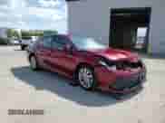 2021 Toyota Camry LE with VIN 4T1C11BK0MU023660, listed as a Copart auction lot 70505895 with 54,746 mi miles and Salvage title. Bid and sale history available at DreamBid. Image 14.