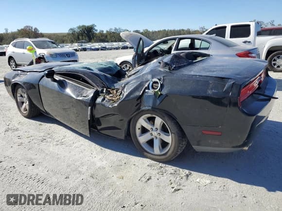 ✅ 2013 Dodge Challenger SXT • VIN: 2C3CDYAGXDH662976 • Lot: 75132514. Wystawiony na Copart z przebiegiem Nie podano. Bezpłatny archiwum sprzedaży aukcyjnych z USA i szczegółowy raport historii pojazdu na DreamBid. Zdjęcie 2.