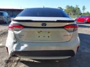 ✅ 2022 Toyota Corolla Hybrid LE • VIN: JTDEAMDE1NJ036006 • Lot: 43697941. Listed on IAAI with 73,310 mi. Free auction sales archive from the USA and detailed vehicle history report at DreamBid. Image 16.