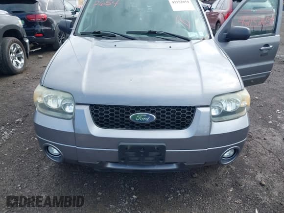 ✅ 2007 Ford Escape Limited • VIN: 1FMCU94167KA76261 • Lot: 42152654. Listed on IAAI with 139,019 mi. Free auction sales archive from the USA and detailed vehicle history report at DreamBid. Image 6.