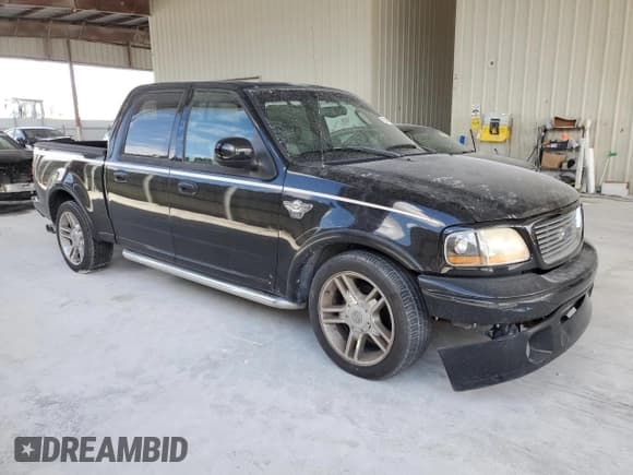 ✅ 2003 Ford F-150 Harley-Davidson • VIN: 1FTRW07343KD83293 • Lot: 55600275. Listed on Copart with 176,233 mi. Free auction sales archive from the USA and detailed vehicle history report at DreamBid. Image 4.