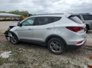 ✅ 2017 Hyundai Santa Fe 2.4L • VIN: 5XYZUDLBXHG498231 • Лот: 56069564. Опубликован ранее на Copart с пробегом Не указан. Бесплатный доступ к архиву аукционных продаж из США и подробный отчёт об истории автомобиля на DreamBid. Изображение 2.