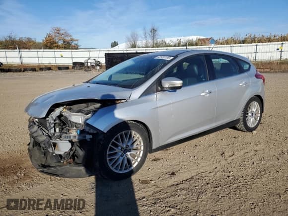 ✅ 2014 Ford Focus Titanium • VIN: 1FADP3N20EL383622 • Lot: 82553195. Listed on Copart with 91,901 mi. Free auction sales archive from the USA and detailed vehicle history report at DreamBid. Image 1.