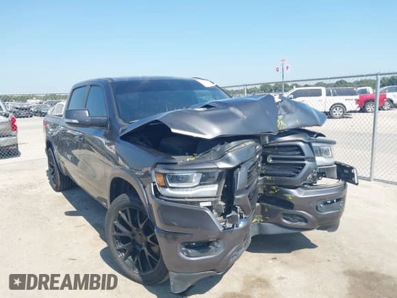 ✅ 2019 Ram 1500 Laramie • VIN: 1C6RREJT2KN798520 • Lot: 43388635. Listed on IAAI with 67,449 mi. Free auction sales archive from the USA and detailed vehicle history report at DreamBid. Image 1.