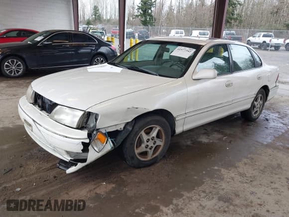 ✅ 1998 Toyota Avalon XL • VIN: 4T1BF18B5WU242038 • Лот: 41577342. Опубликован ранее на IAAI с пробегом 195 707 миль. Бесплатный доступ к архиву аукционных продаж из США и подробный отчёт об истории автомобиля на DreamBid. Изображение 17.