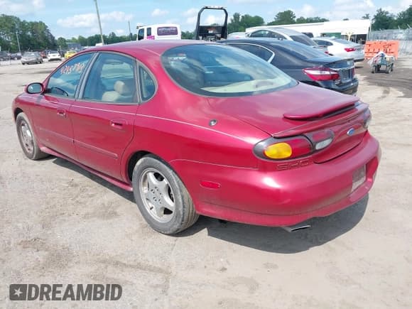 ✅ 1997 Ford Taurus • VIN: 1FALP54N2VA124127 • Lot: 42457913. Listed on IAAI with 202,302 mi. Free auction sales archive from the USA and detailed vehicle history report at DreamBid. Image 3.